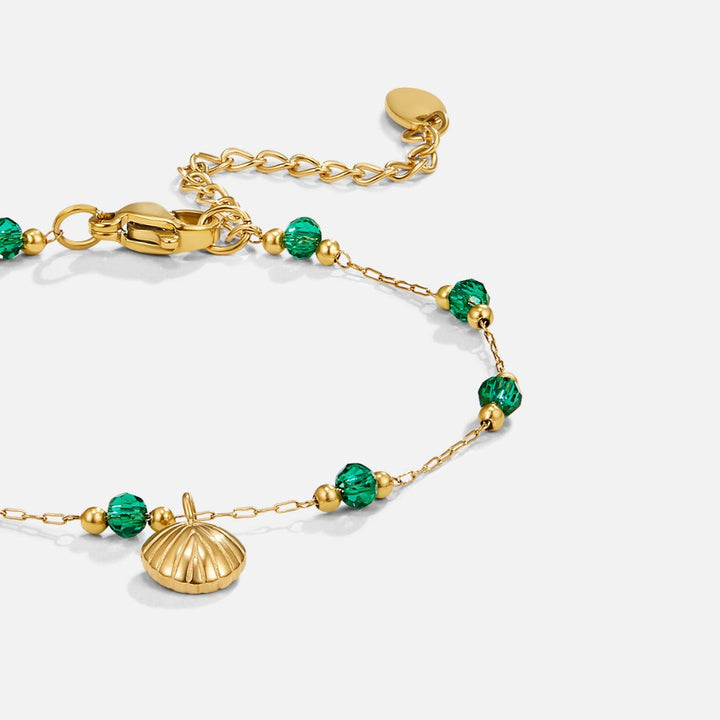 Bracelet en coquillage doré Nerissa et perles vertes