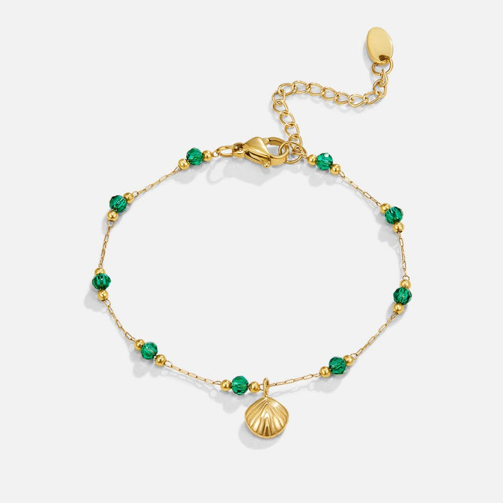 Bracelet en coquillage doré Nerissa et perles vertes