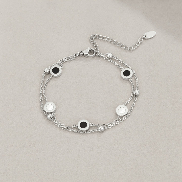 Bracelet en argent avec pierres onyx et blanches