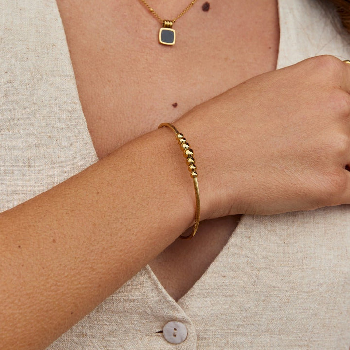 Bracelet en perles dorées Yuri